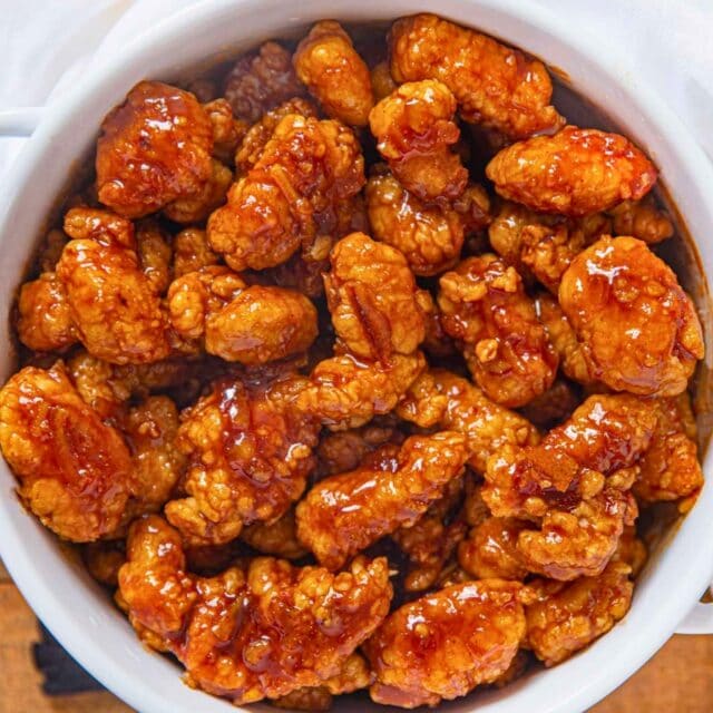 Cooked chicken in sauce in pot