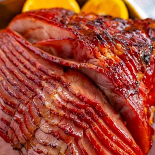 Close up of glazed ham in a pan