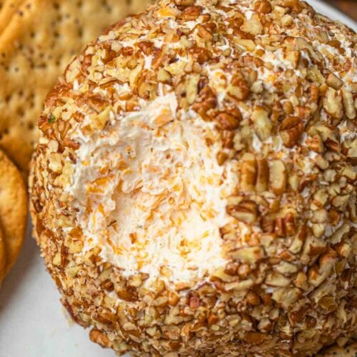 scoop taken out of cheese ball