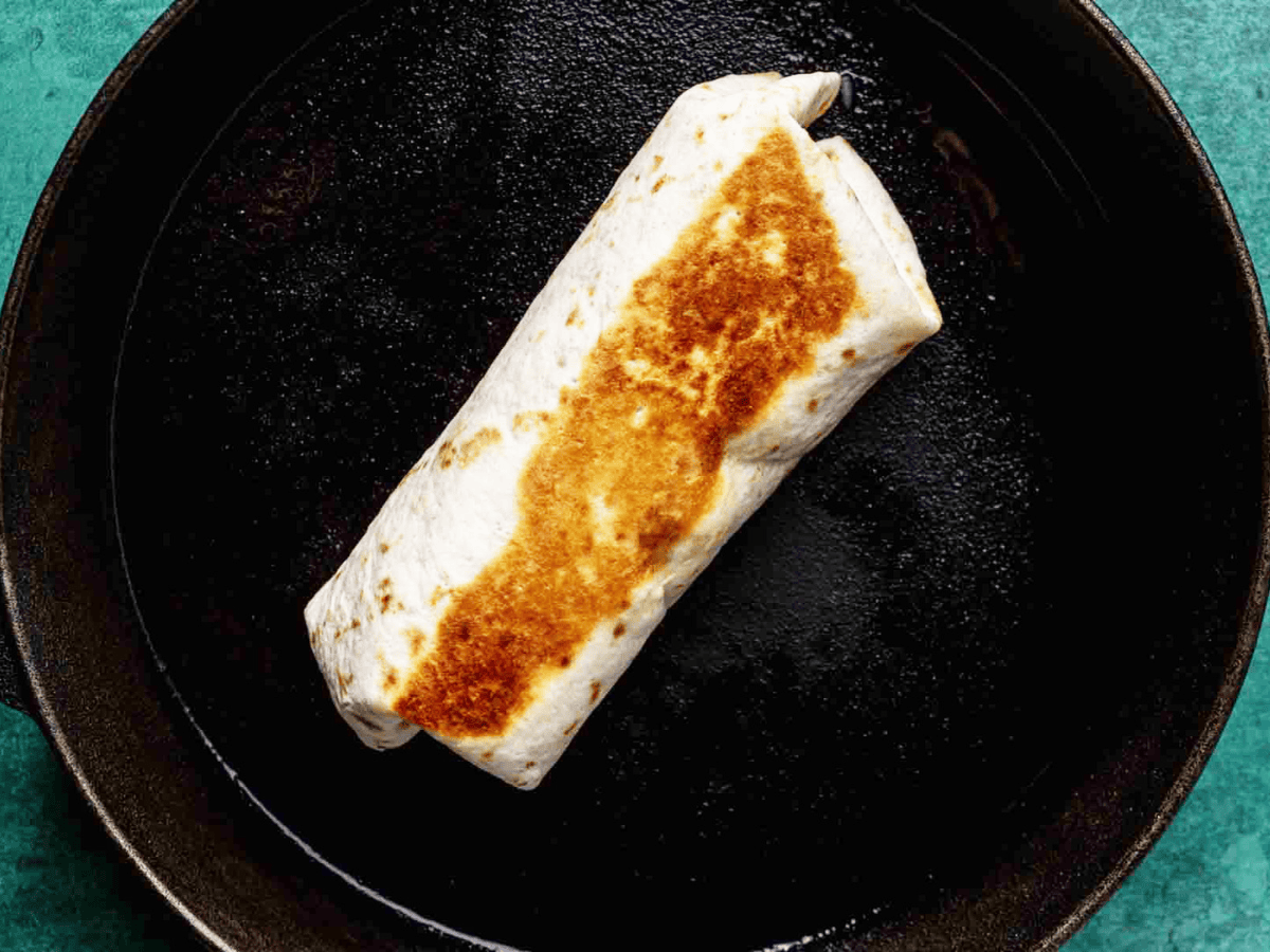 Tortilla wrapped and grilled on a pan.