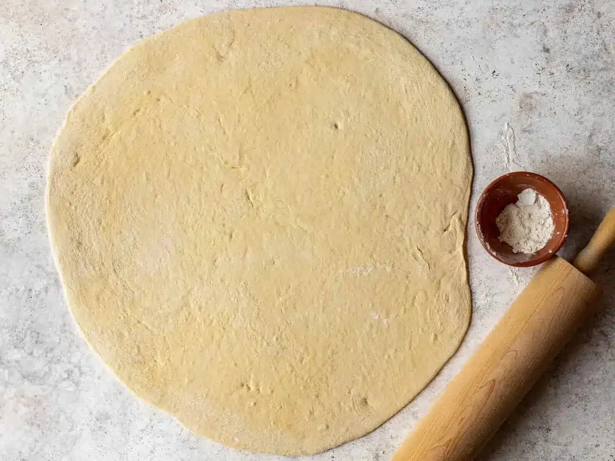 dough rolled out shaped in circle