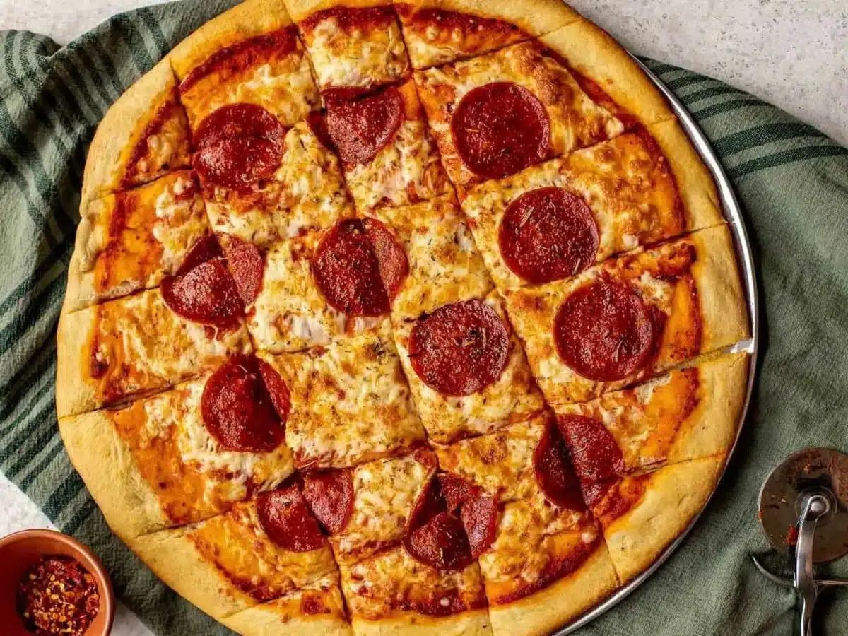 Baked dough with ingredients cut into squares