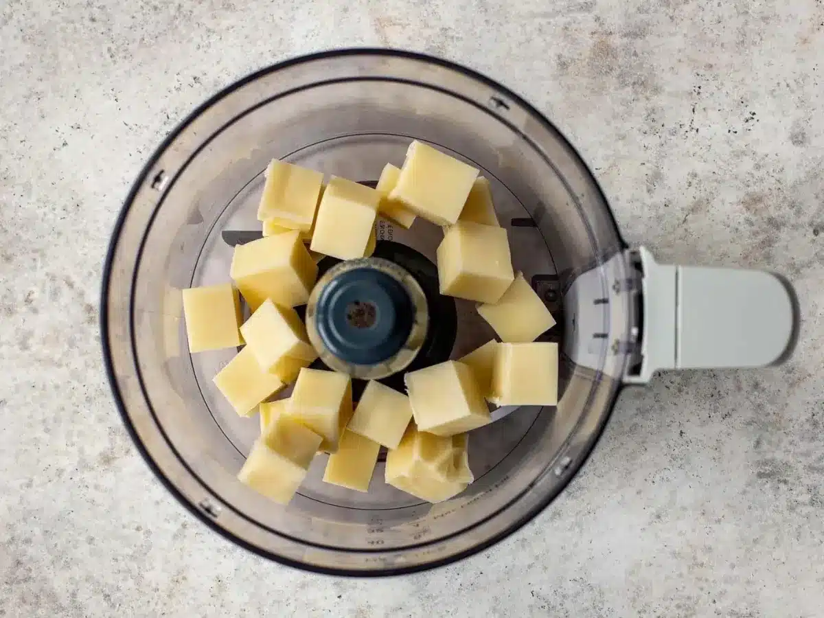 Cheese chucks in processor 
