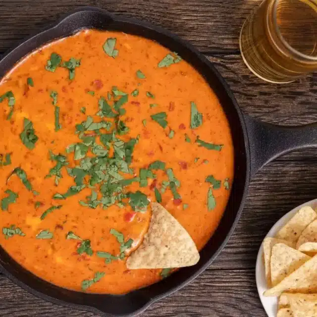 finished dip with chips and drink