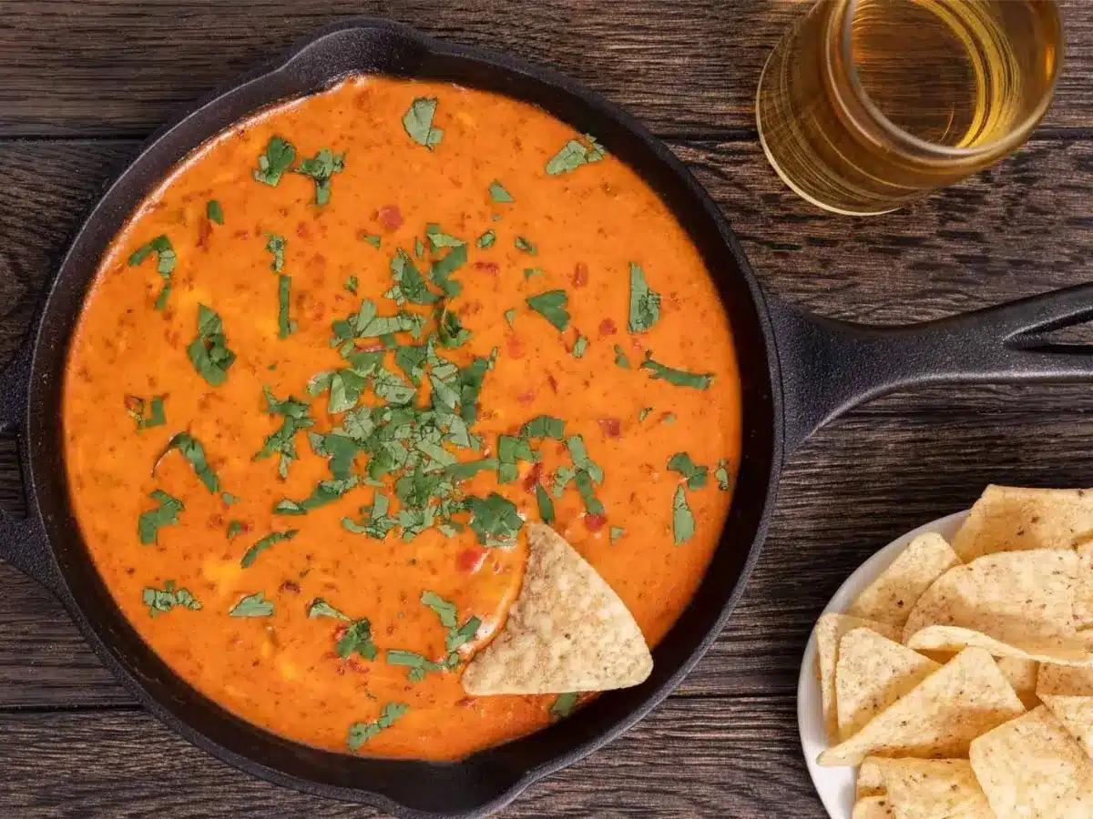 finished dip with chips and drink 