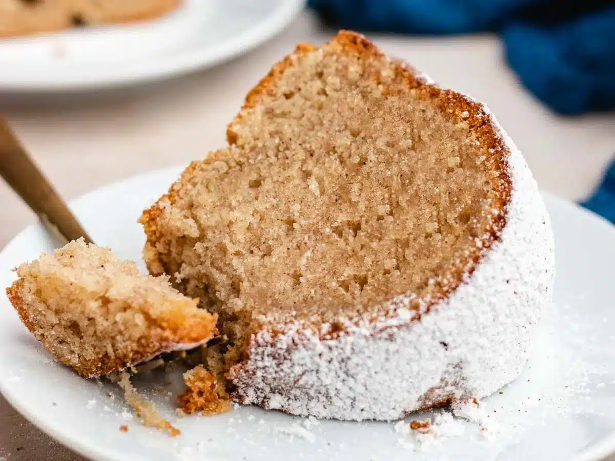 fork taking bite of cake 