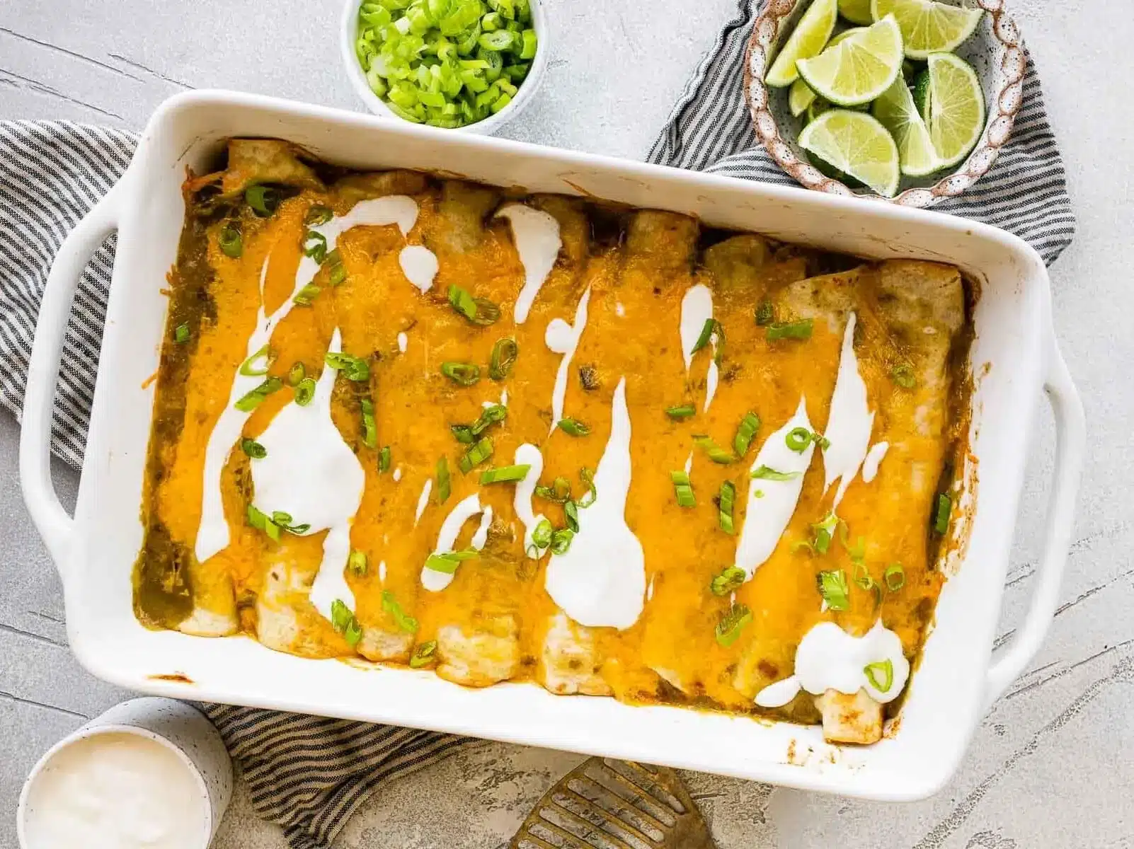 enchiladas with shrimp with sauce in pan