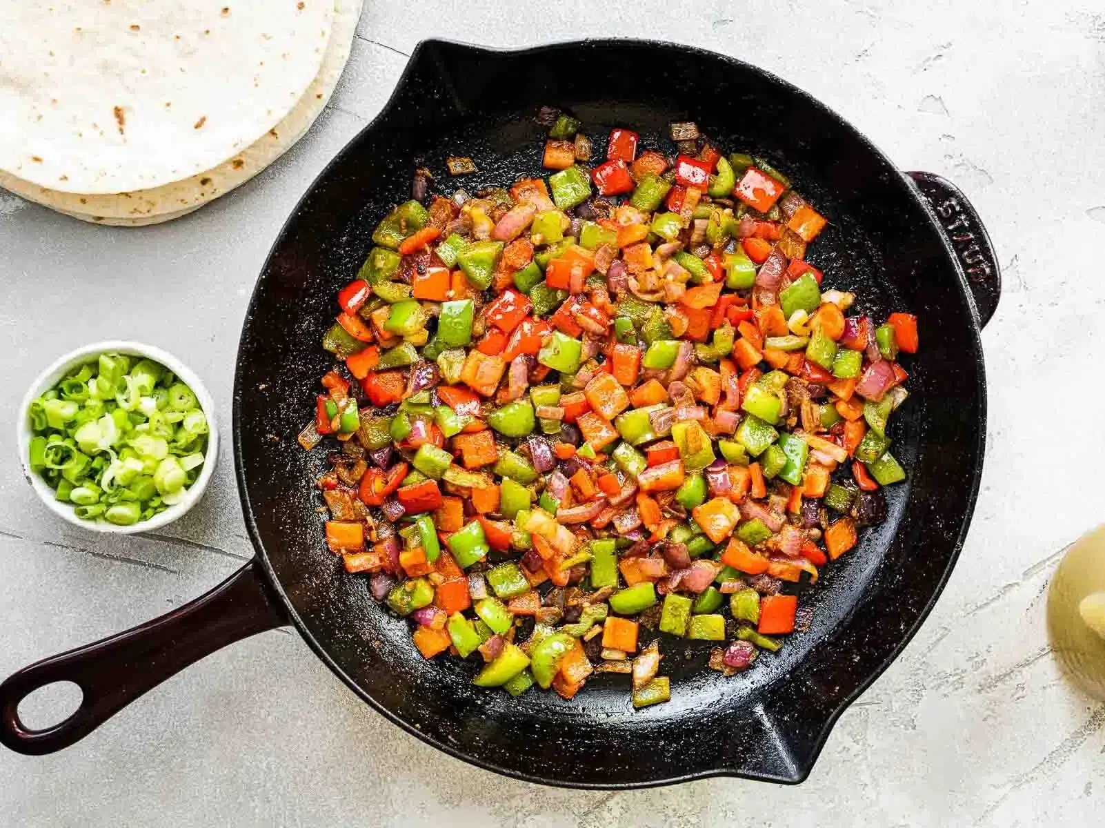 enchiladas with shrimp in the making with cast iron