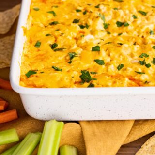 Close up of side of casserole dish full of Buffalo Dip