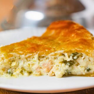 Slice of Chicken Spinach Pie on plate
