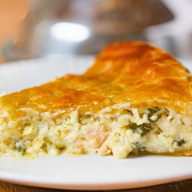 Slice of Chicken Spinach Pie on plate