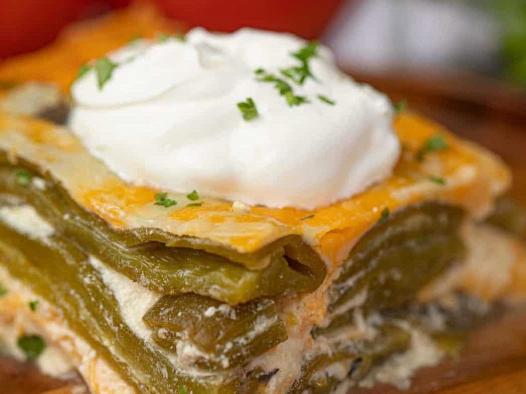 Serving of casserole with sour cream on top