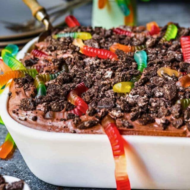 Decorated cake in baking dish.