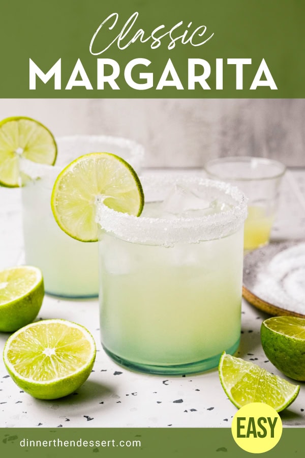 Margarita in glass with lime wheel and salt on rim.