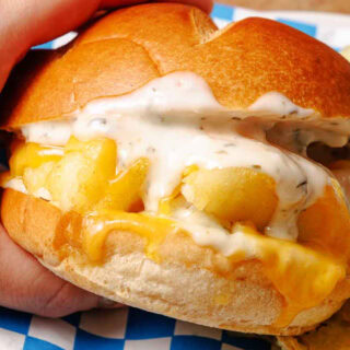Close up of holding sandwich in hands