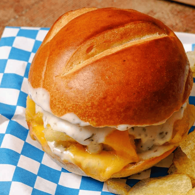 fish sandwich on plate with chips