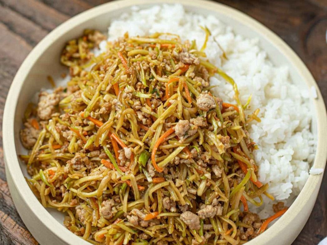 Egg Roll served in a bowl over rice