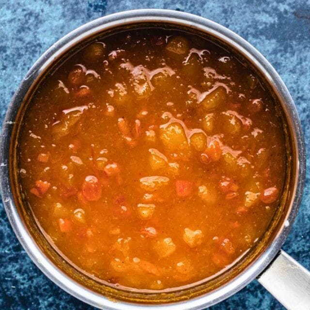 Cooked and reduced chutney in sauce pan.