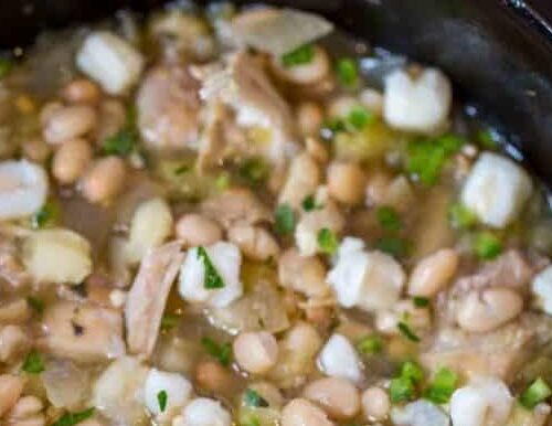 Close up of white chicken chili in slow cooker