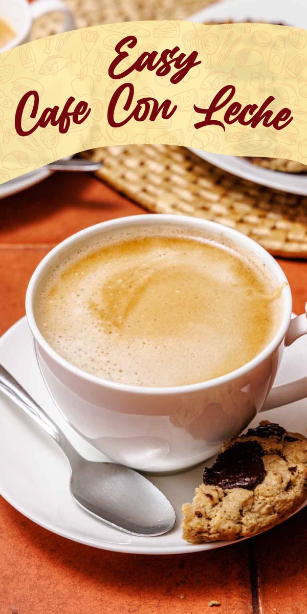 Cup of coffee with milk on saucer with cookie.
