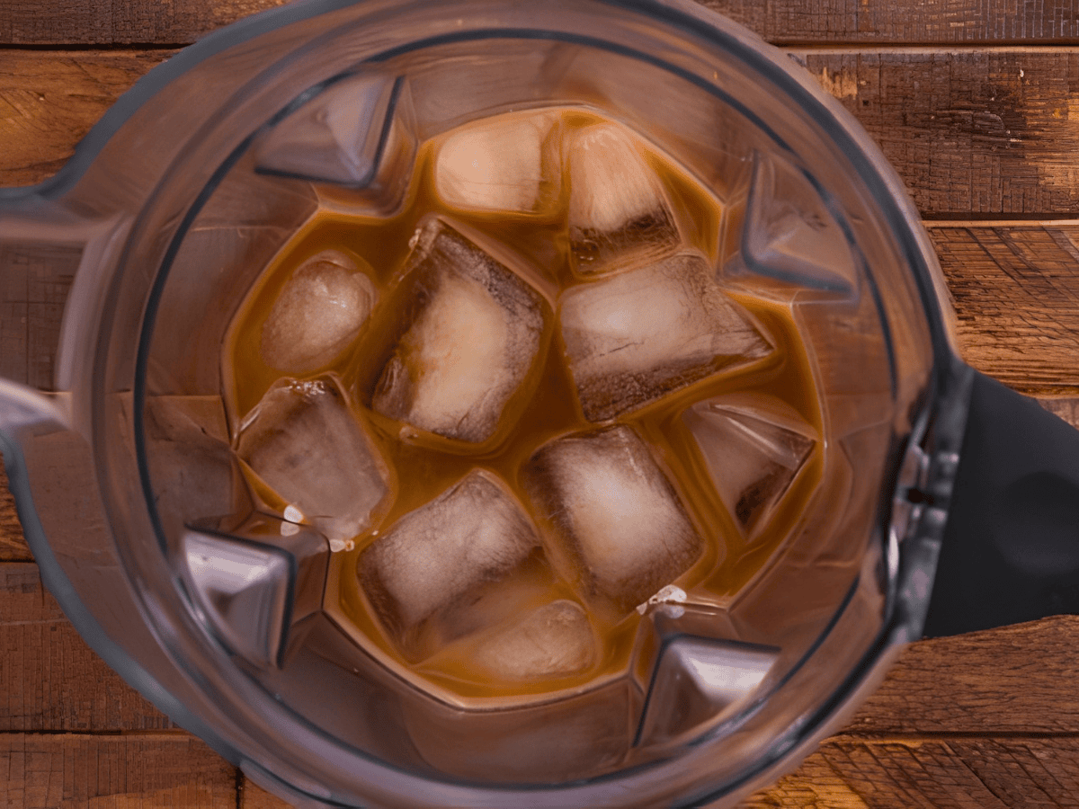coffee, milk, and ice in blender