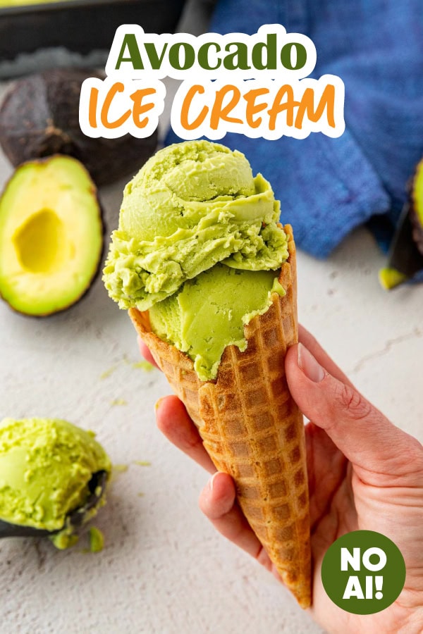 Two scoops of ice cream in cone.