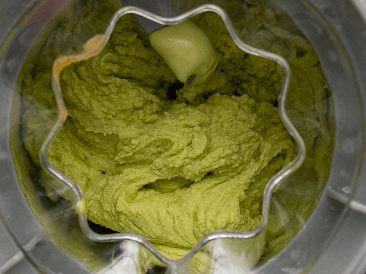 Overhead view of ingredients in ice cream machine.