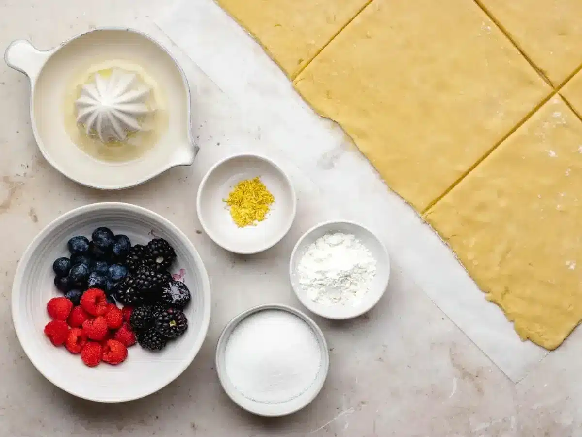 Ingredients in bowls with dough