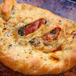pizza pastry on baking sheet