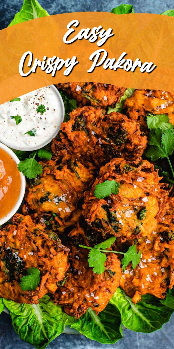 Crispy Pakora fritters with dipping sauce on the side
