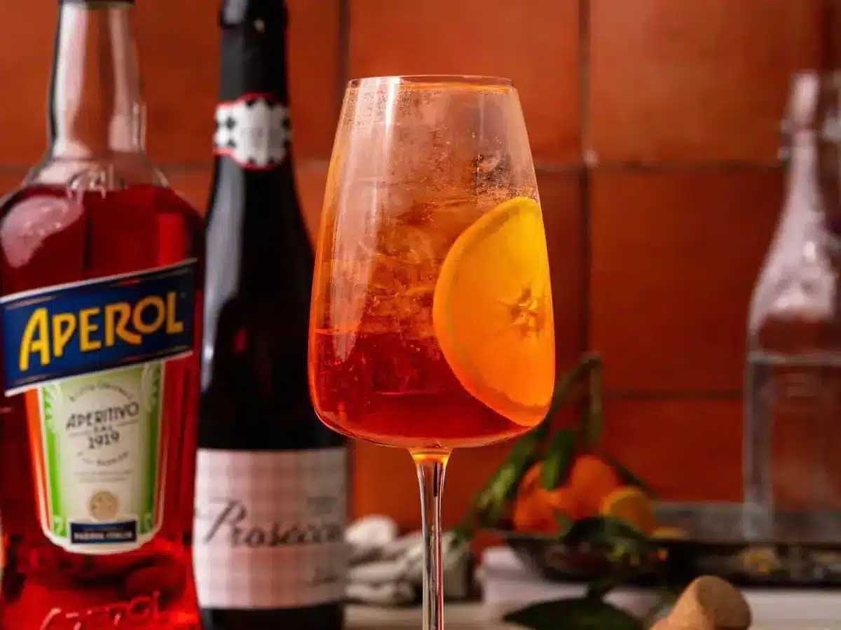 bubbly orange cocktail in a wine class 