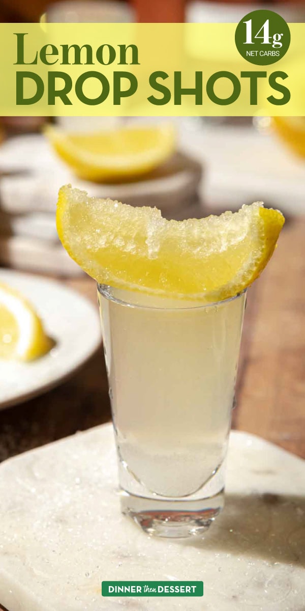 Close up of lemon drop in shot glass with sugared lemon