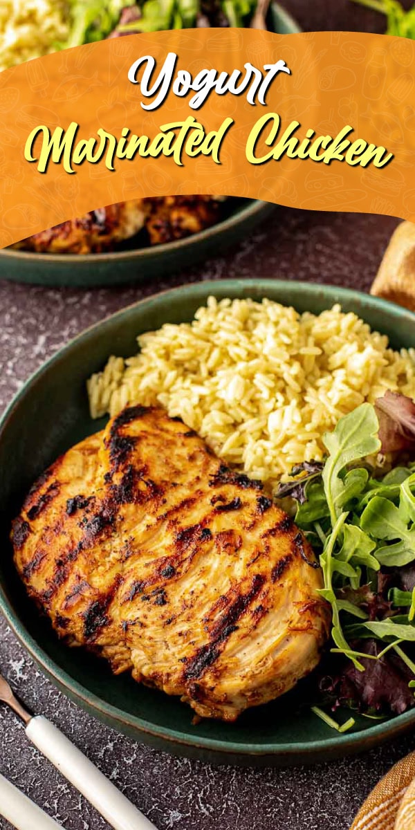 Grilled chicken breast plated with rice and greens