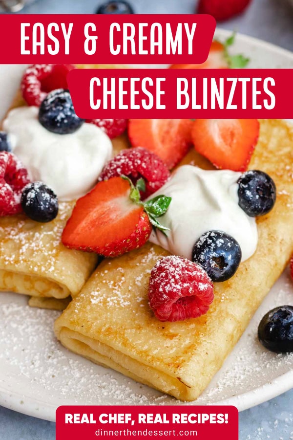 finished rolled and filled blintz with whipped cream and berries