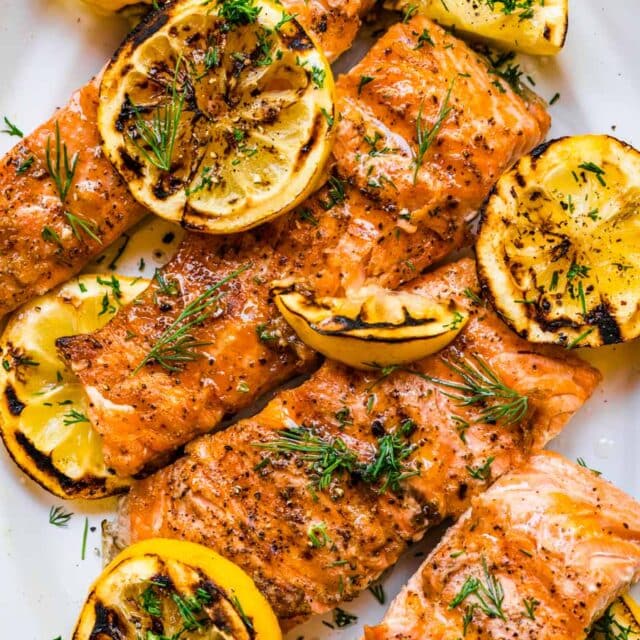 Cooked salmon garnished with lemon