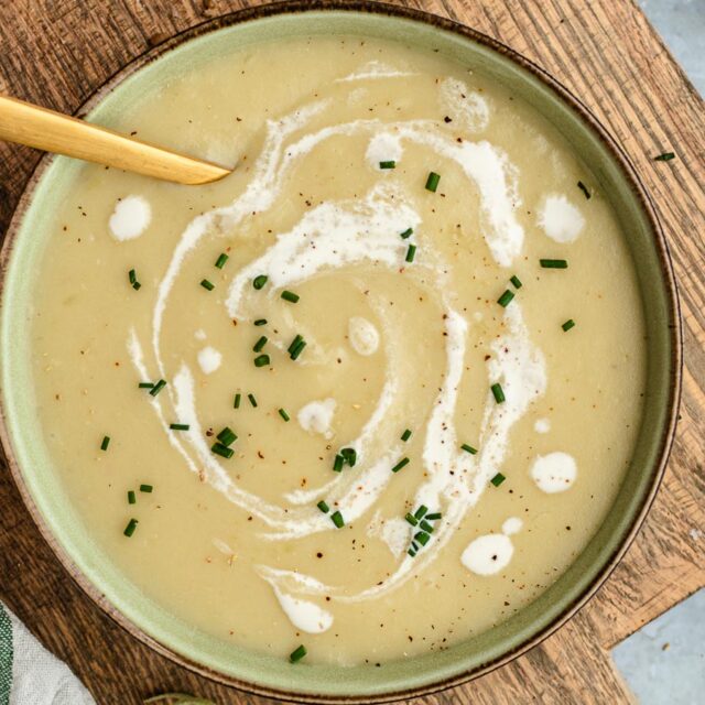 Soup bowl filled with creamy soup.
