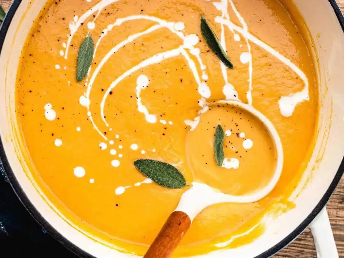 finished pot of soup with a ladle 