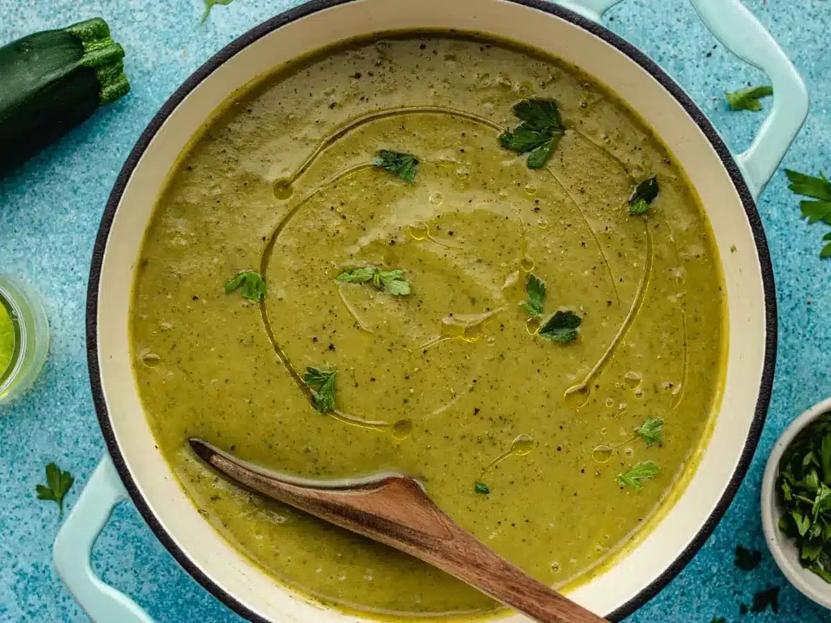 finished soup in a pot with a wooden spoon