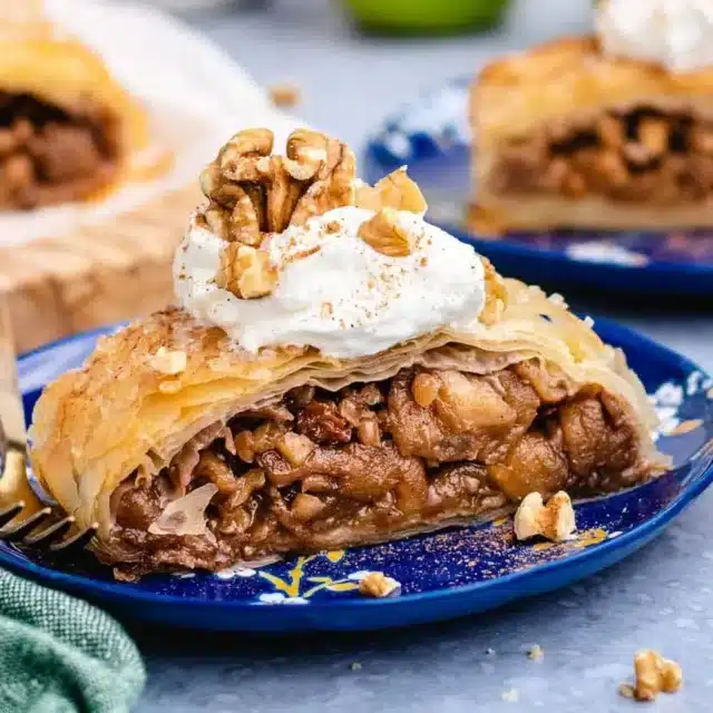 pastry plated on pie plate with whipped cream on top