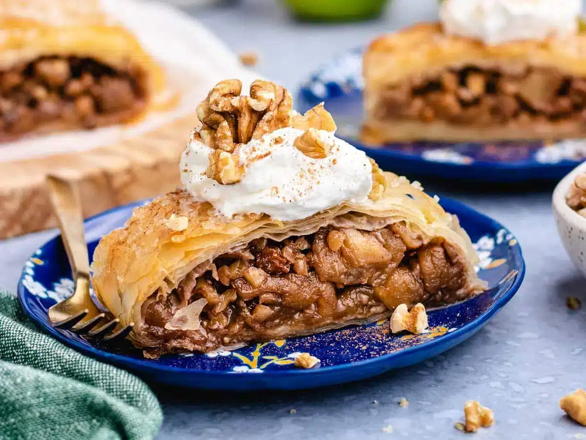 pastry plated on pie plate with whipped cream on top