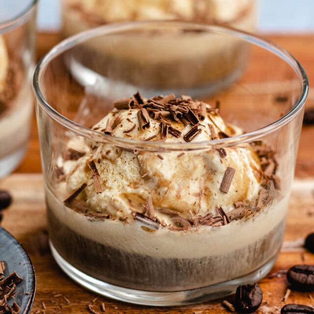 Dessert cup filled with ice cream, espresso, and topped with chocolate shavings.