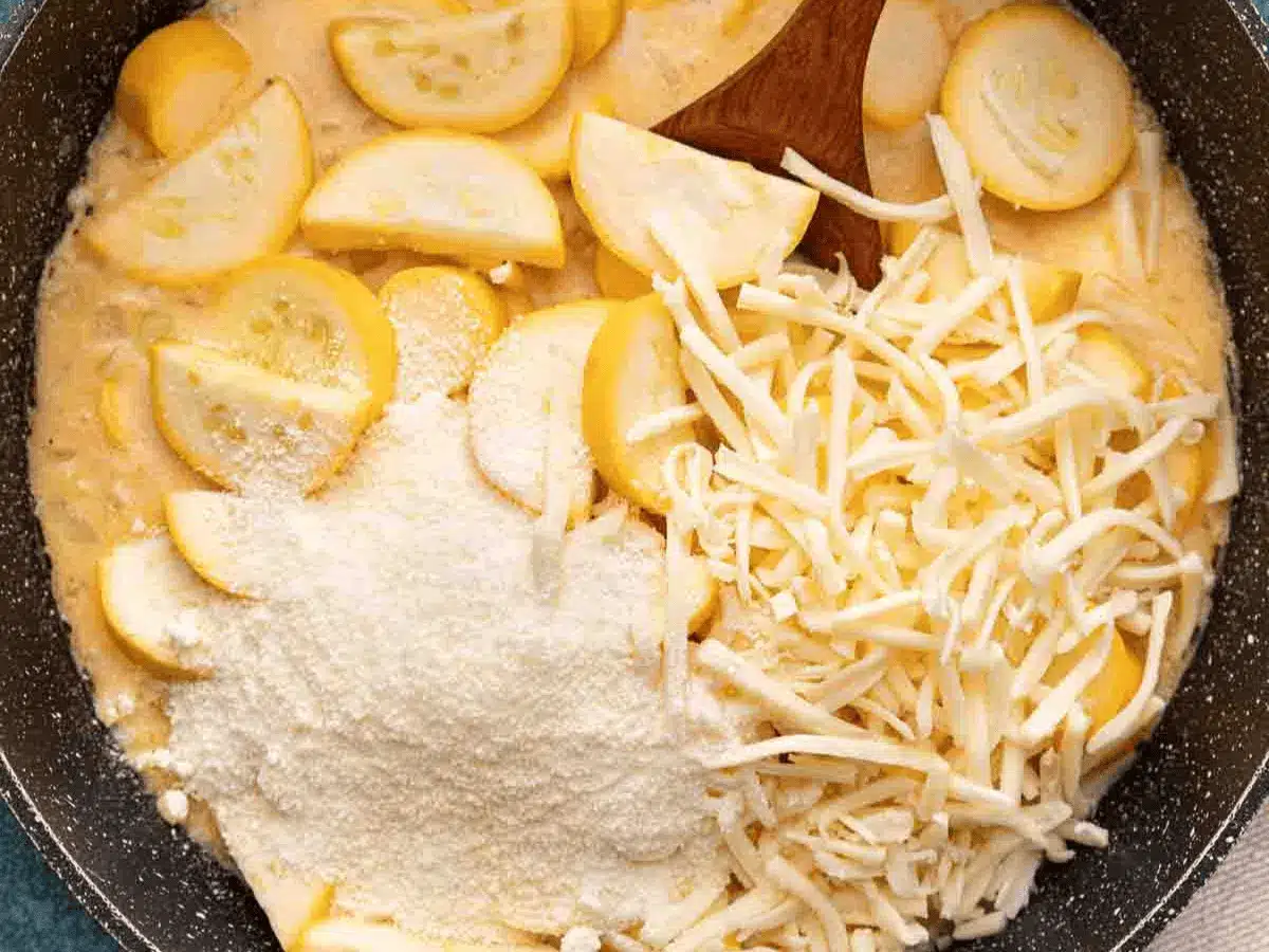mixing ingredients for casserole in bowl 