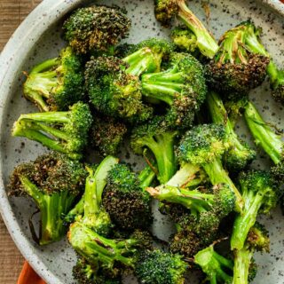 Broccoli florets on plate.