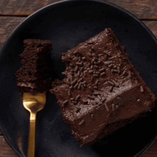 Cake served on plate with fork