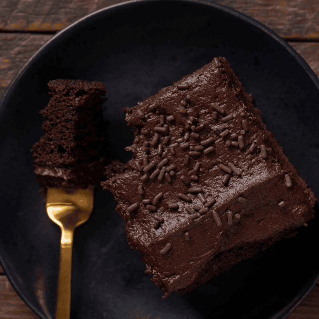 Cake served on plate with fork