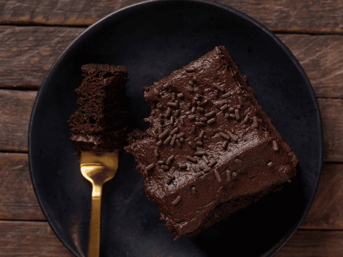 Cake served on plate with fork