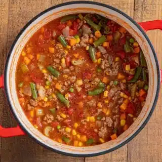 pot full of meat and veggie soup