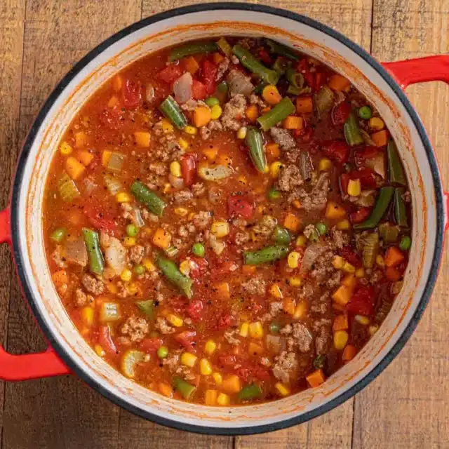 pot full of meat and veggie soup