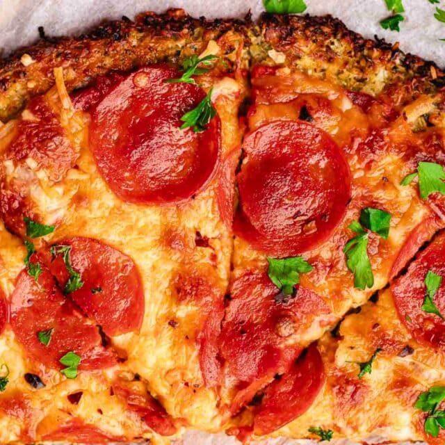 Photo of sliced pizza pie with pepperoni topping
