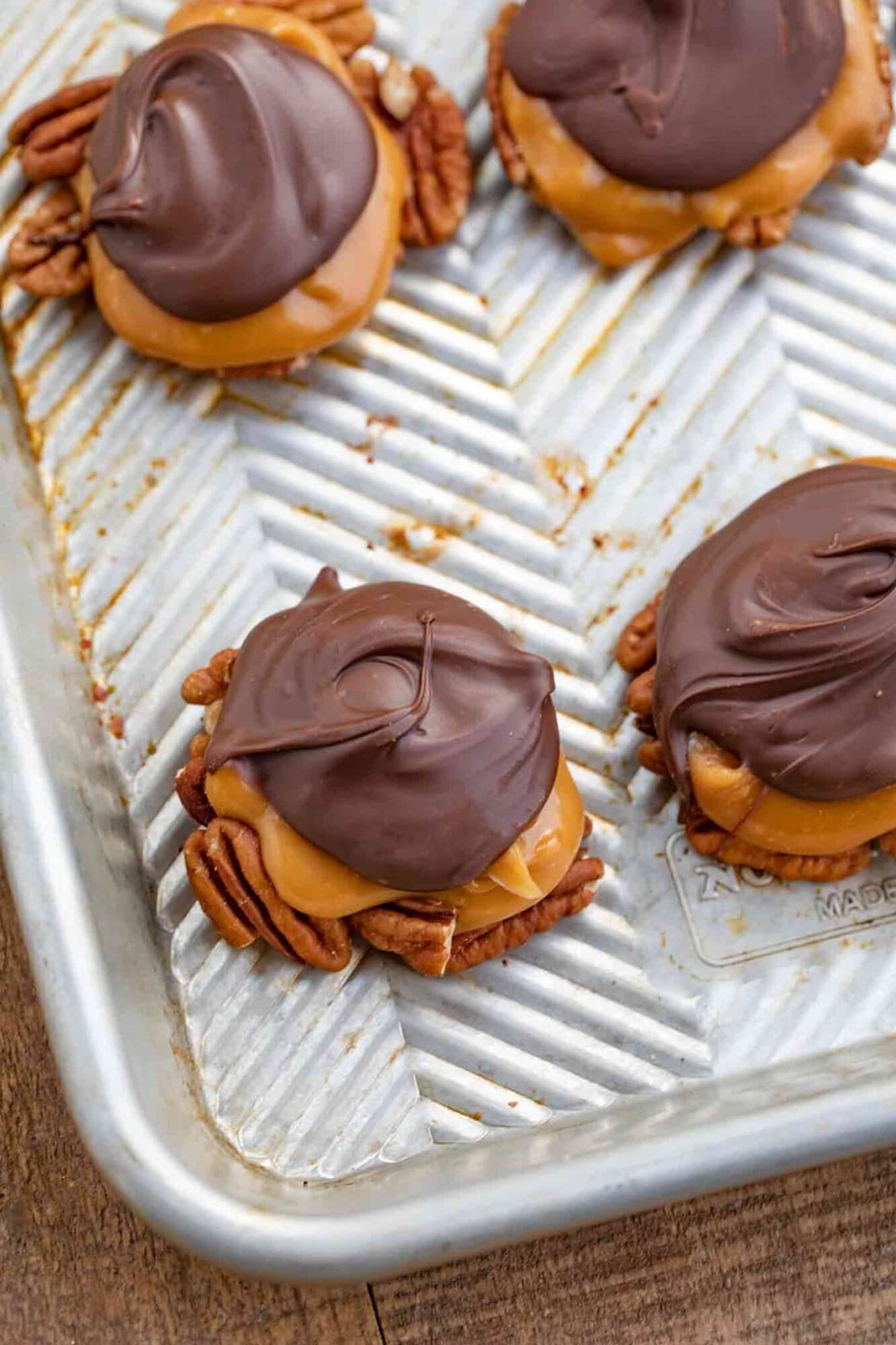 Four candies shown on a baking sheet